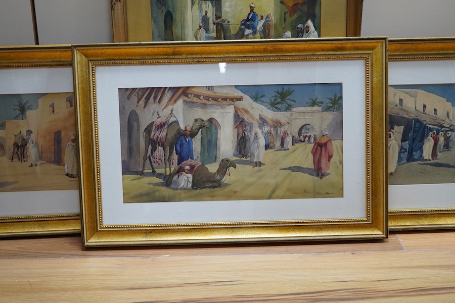 Giovanni Barbaro (1864-1915), Orientalist street scenes with figures and camels, each signed, four watercolours, largest 70 x 30cm